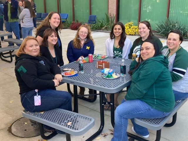 Group of Michigan Millers employees at UM v. MSU Tailgate.