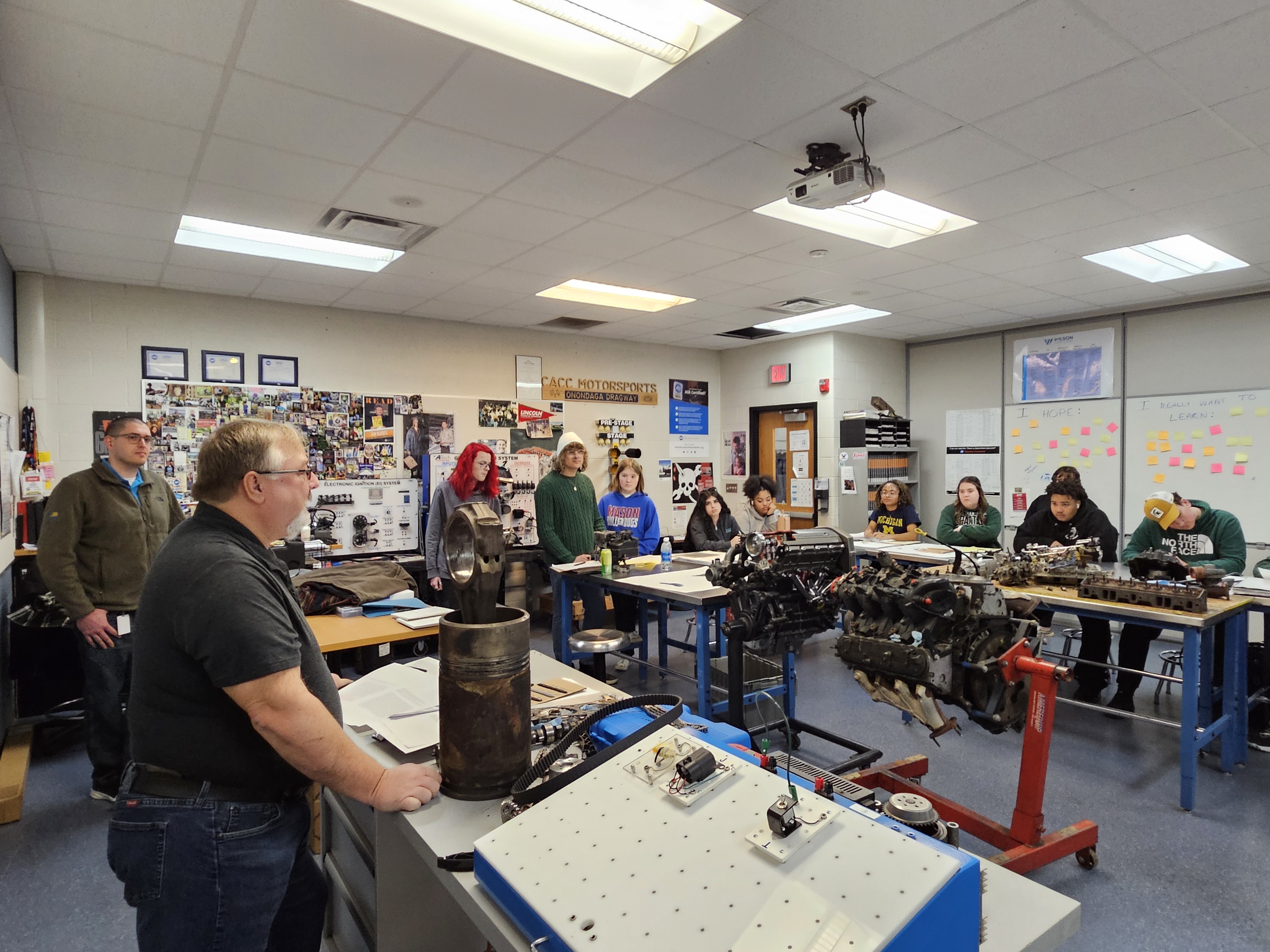 Michigan Millers employees talking with Wilson Talent Center students in classroom setting.
